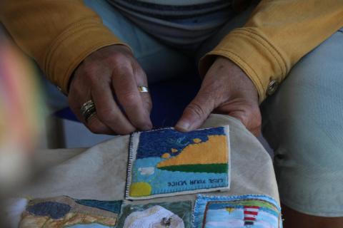 Photo: Sewing Use Your Voice to the Coat of Hopes